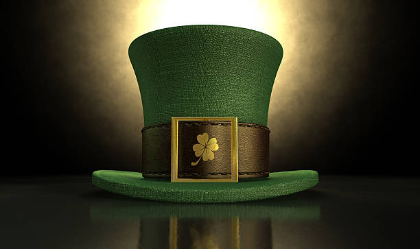 Green Leprechaun Shamrock Hat A green material leprechaun hat with a brown leather band emblazened with a gold shamrock and buckle on a dark spotlit background leprechaun hat stock pictures, royalty-free photos & images