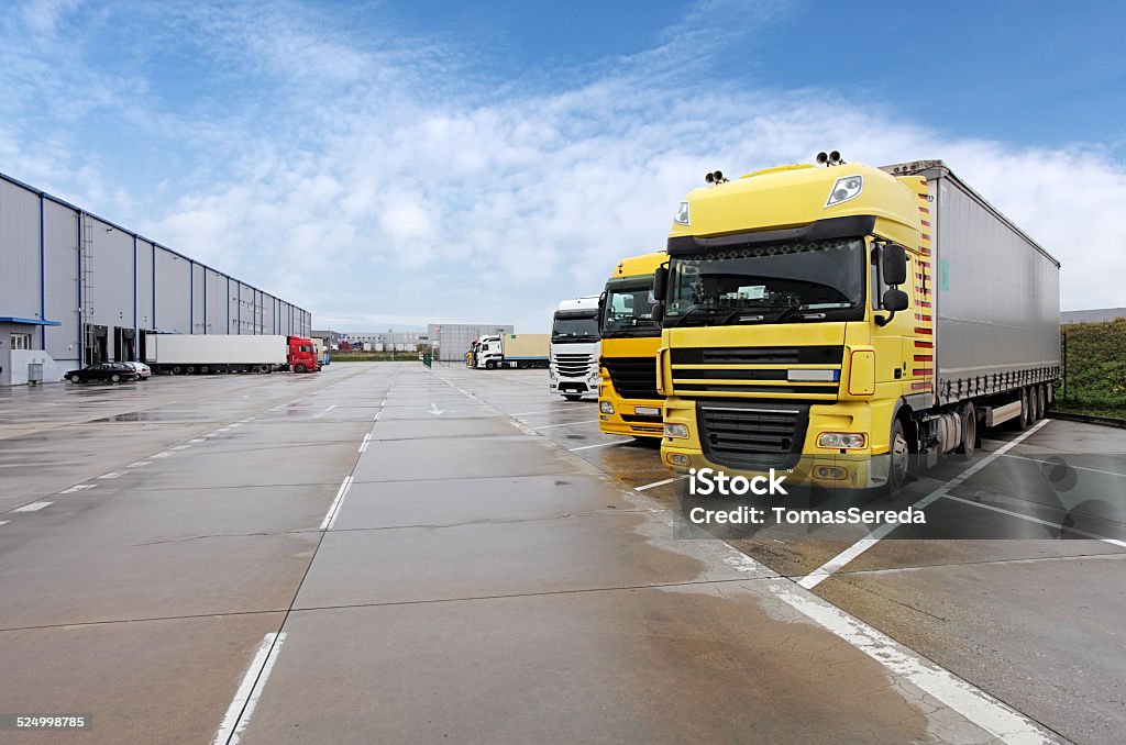 Yellow truck in warehouse Forklift Stock Photo