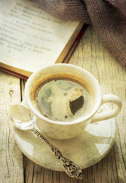 istock cup of hot coffee with gray wool sweater 525001845