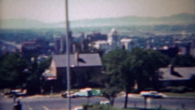 1959: View from city hall of the growing city below and mountains.