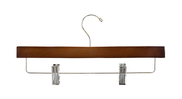 Trouser hanger A new trouser hanger with metal clips on a white background. coathanger stock pictures, royalty-free photos & images