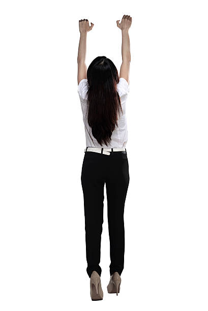 Asian business woman hanging on something