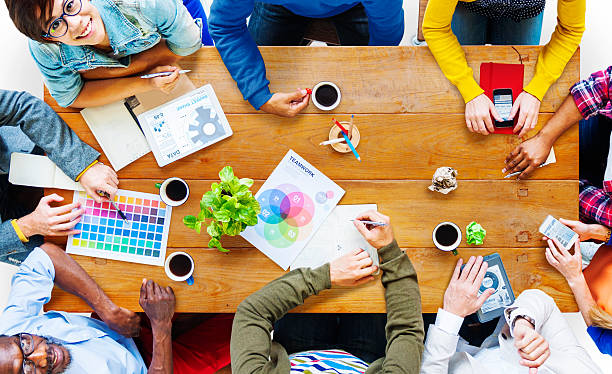 istock Group of Multiethnic Designers Looking Up Concept 525018858