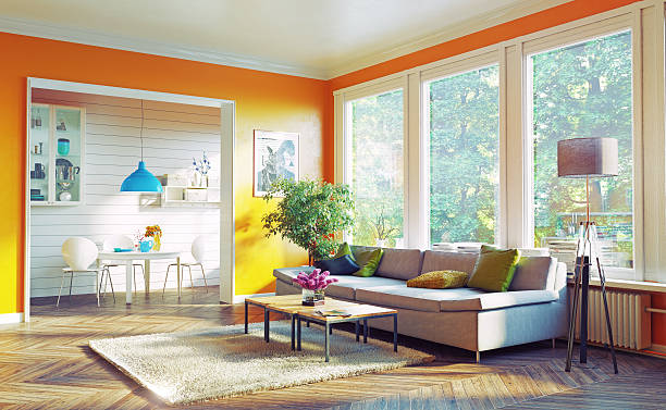 モダンなリビングルーム - オレンジ色 写真 ストックフォトと画像