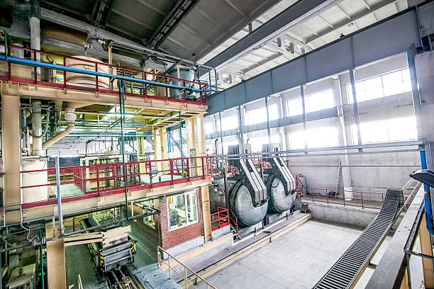 istock Modern equipment at factory producing concrete blocks 525023442