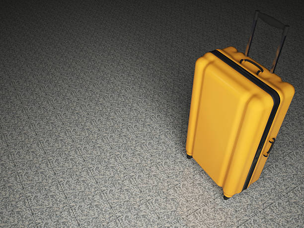 istock Large luggage on stone floor background. 525023842