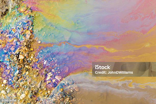 Psychedelic Abstract Of Toxic Oil Pollution On Water Stock Photo - Download Image Now