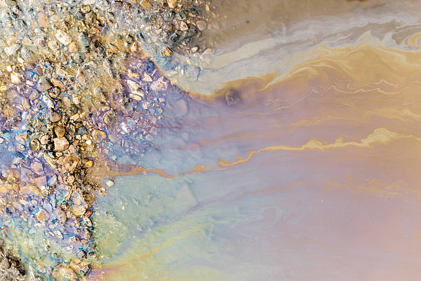 istock Psychedelic Abstract of Toxic Oil Pollution on Water 525025046