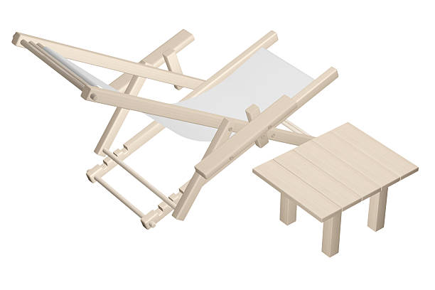 istock Wooden beach deck chair and table isolated on white background. 525025976