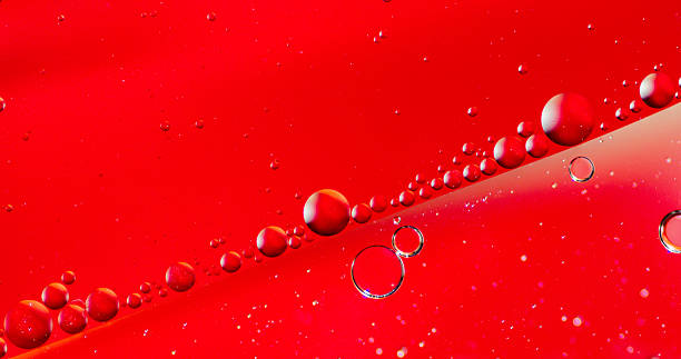 istock Oil on Water Red and Silver Bubble Abstract 525026010