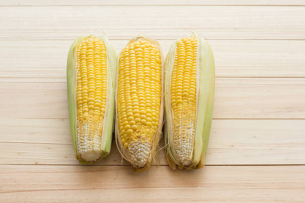 istock Top view of corn on wood table, Space for text 525032872