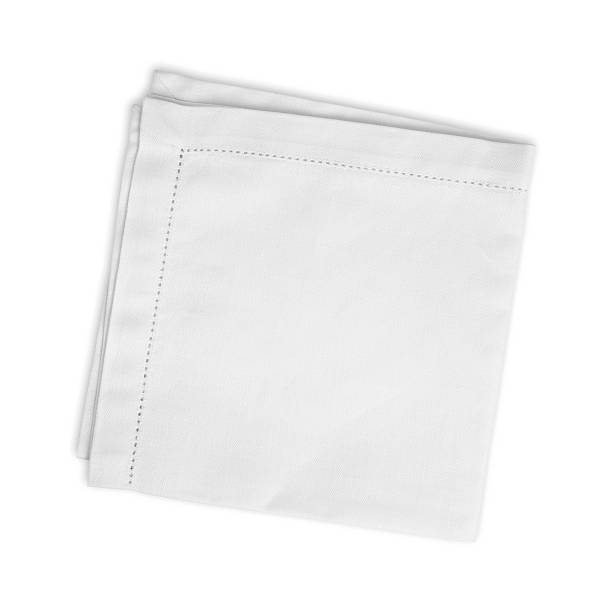 istock White folded linen napkin isolated on white background 525034010