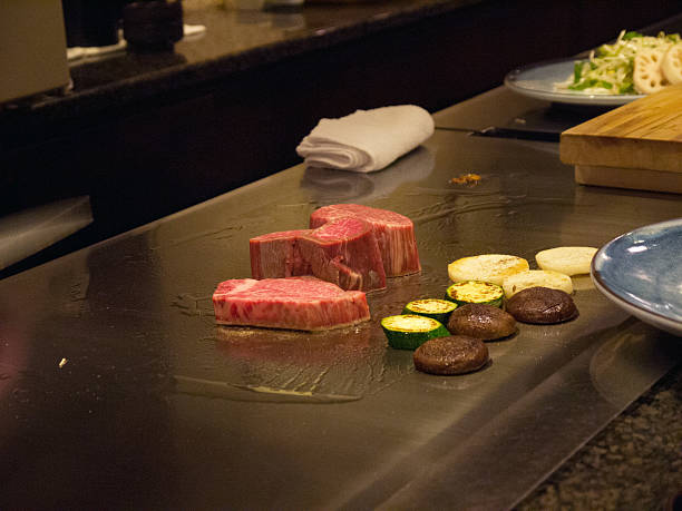istock Cooking Japanese marbled beef chops in teppan yaki restaurant 525034162