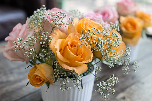 istock Roses  on wooden desk , soft focus 525035560