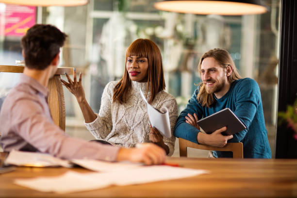 istock Smiling business people communicating on a meeting. 525035722