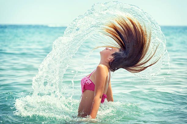 istock Beautiful Young Girl Enjoying on The Beach 525036014