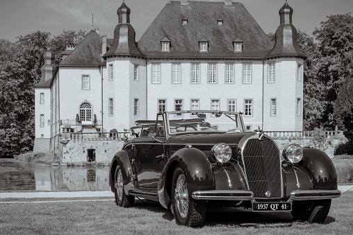 Jüchen, Germany - August 1, 2014: 1937 Talbot Lago T150 C Cabriolet D'Usine classic car on display during the 2014 Classic Days event at Schloss Dyck, Vintage style image.