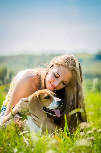 istock Teenager with her dog 525037592