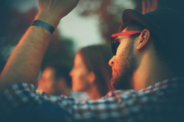 istock People enjoying concert party. 525037727