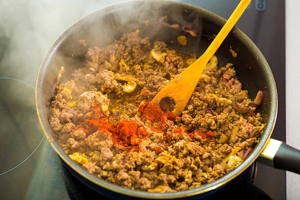 istock Proces of preparing spaghetti Bolognese 525038259