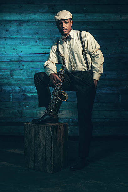 istock African american jazz musician with saxophone. 525038909