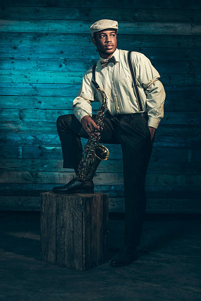 istock African american jazz musician with saxophone. 525038977