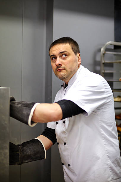 istock Portrait of baker at work 525039361