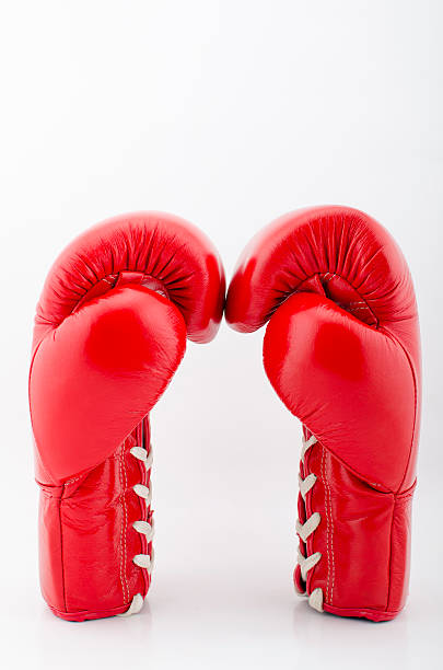 istock Red Boxing gloves isolated with white blackground 525040203