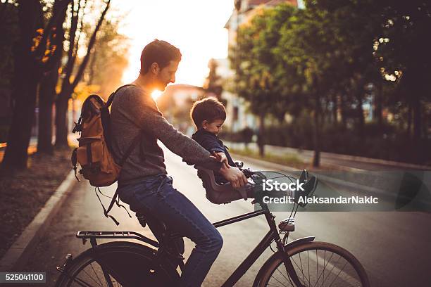 Fun And Games On A Bicycle Stock Photo - Download Image Now - City, Cycling, Family