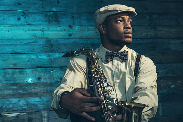 istock African american jazz musician with saxophone. 525041157