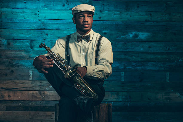 istock African american jazz musician with saxophone. 525041159