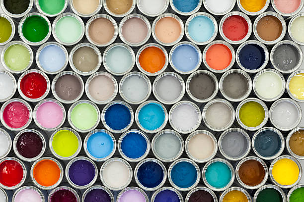 Paint pot samples A variety of paint can samples arranged on a grid. color swatch photos stock pictures, royalty-free photos & images
