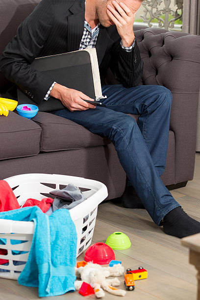 istock Young father working at home, burnout 525042127