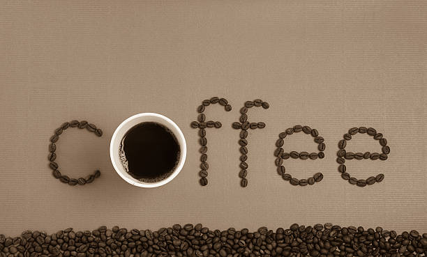 istock coffee text beans on paper texture in vintage style 525042656