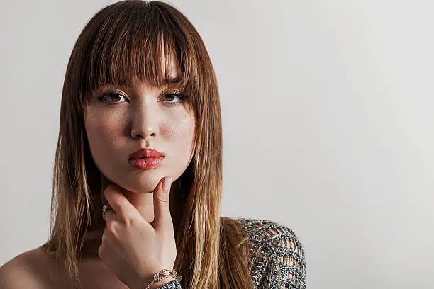 Photo of Gorgeous girl portrait with freckles