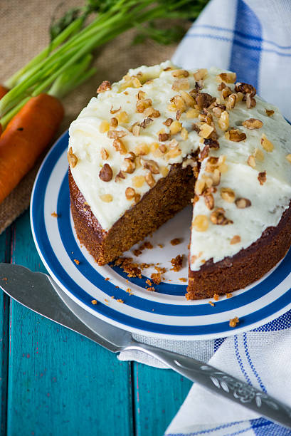 istock Traditional homemade  carrot cake and fresh carrots 525043021