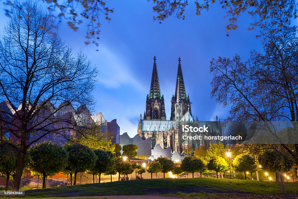 Cologne Cathedral at night, Germany The Cologne Cathedral (Kölner Dom) at night. View from the Rhine promenade. Cologne Cathedral Stock Photo