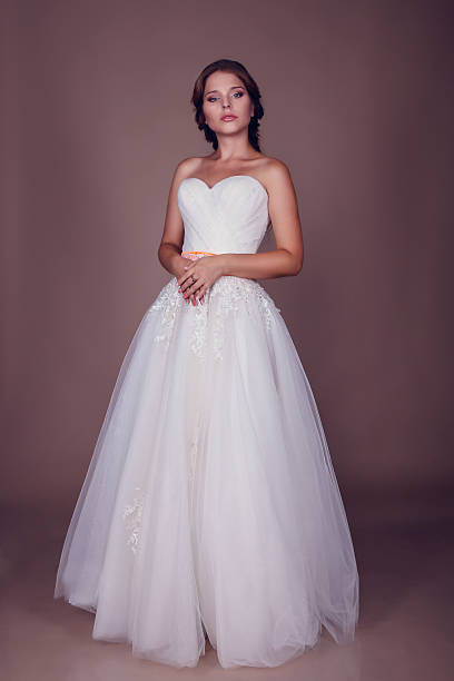 istock Beautiful bride posing in her wedding day 525056165