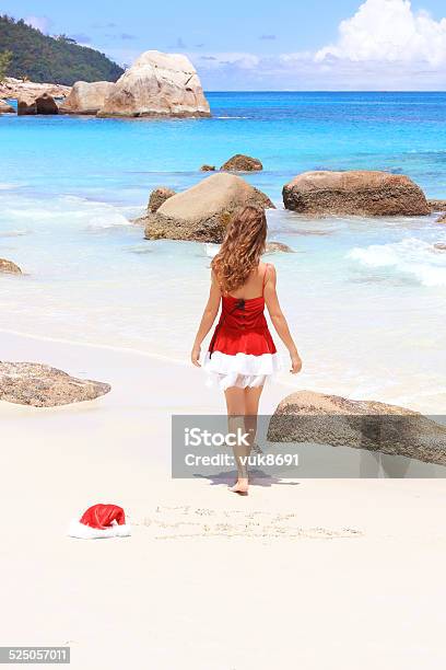 Christmas On The Beach Stock Photo - Download Image Now - Adult, Adults Only, Barefoot