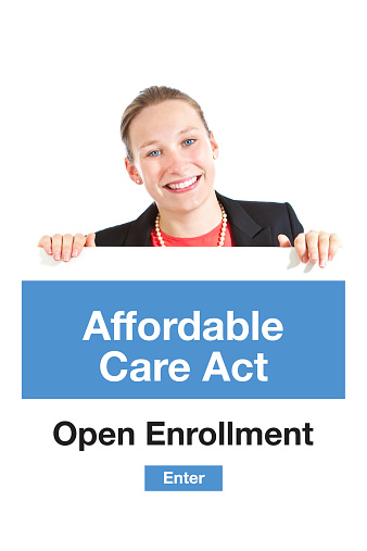 Woman signing up and joining the Affordable Care Act Obamacare open enrollment before deadline.