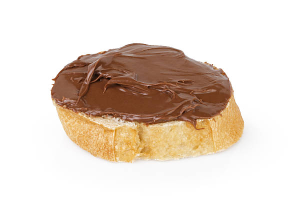 istock slice of baguette with chocolate cream 525058545