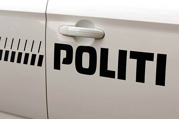 Inscription detail of a police car in Copenhagen, Denmark.