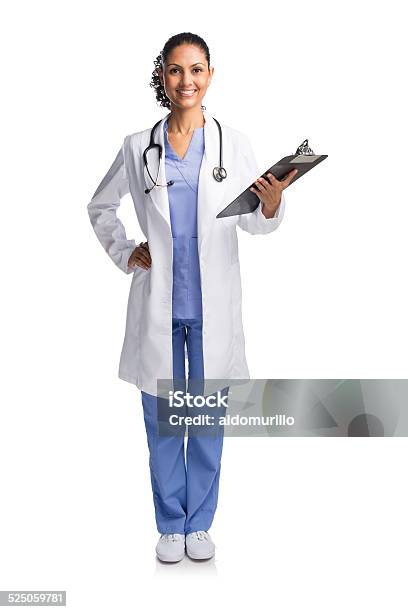 Female Doctor Holding A Clipboard Stock Photo - Download Image Now - Doctor, Full Length, 30-34 Years