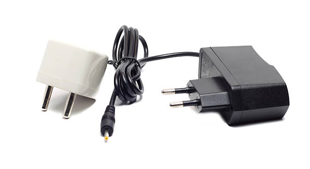 istock power supply and adapter on white background 525061689