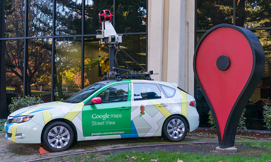 Mountain View, CA, USA - November 22, 2014: Google maps street view car in front of Google office on Nov 22, 2014 in California. Google is a multinational company specializing in Internet related services and products.