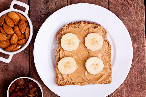 istock peanut butter bread with banana, almond and raisins 525073685