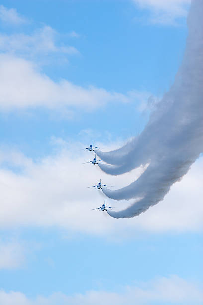 istock Airshow performed by Japanese military fighter planes called Blue Impulse 525076487