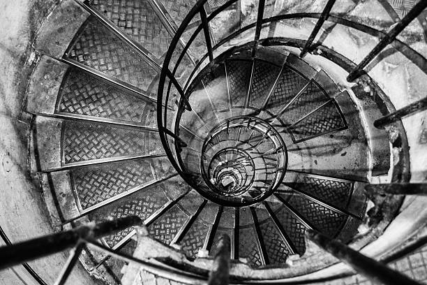 istock Looking down a spiral staircase in Paris 525078133
