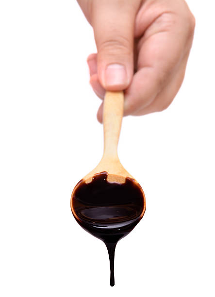 istock Wooden spoon and chocolate fudge 525078425