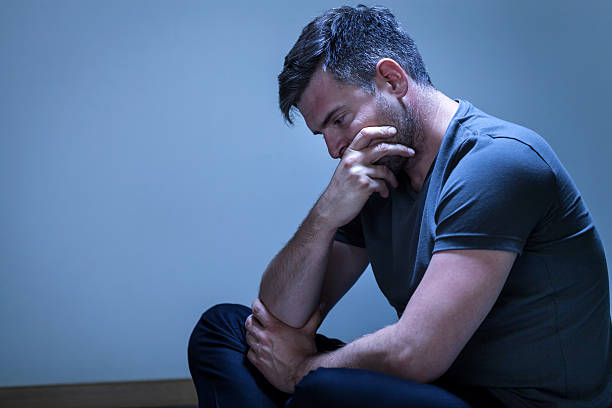 istock Portrait of sorrowful, grieving man 525104549